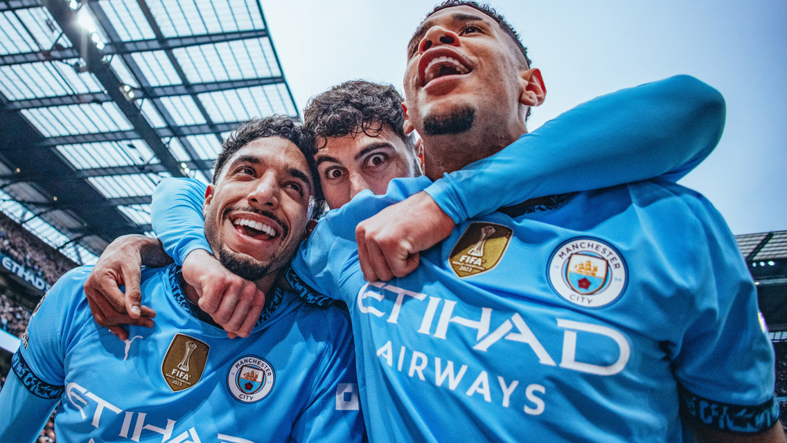 ALL SMILES: The players show their delight.