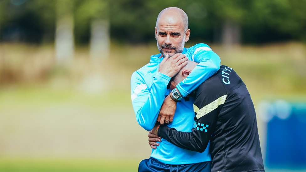 WHO'S LOVING YOU : Can you spot which player Pep is embracing here?
