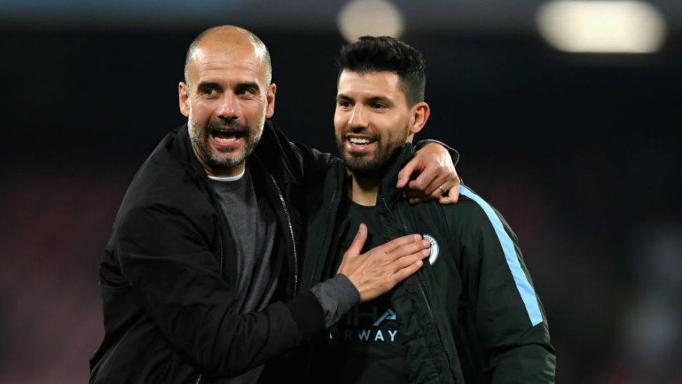 HISTORY MAN : Manager Pep Guardiola greets Sergio after his historic goal at Napoli