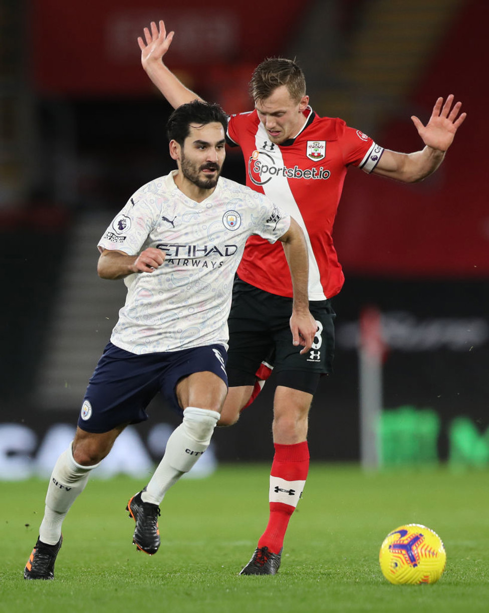 GUNDO-GONE : Ilkay escapes from Ward-Prowse in midfield.