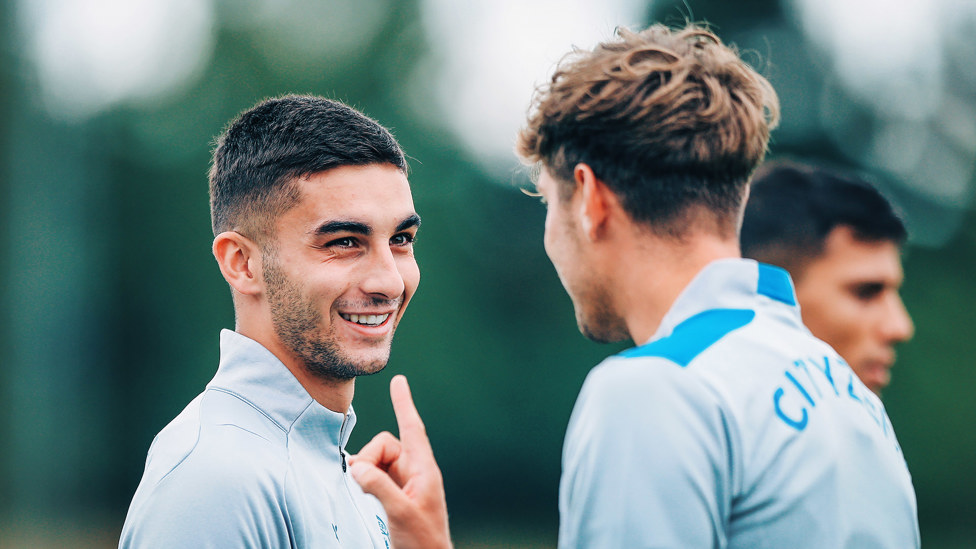 WING WONDER: Ferran Torres has a chat with John Stones