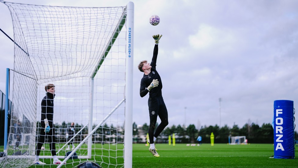 BIG BEN  : Goalkeeper Ben Vickery does brilliantly to deny his team-mate. 