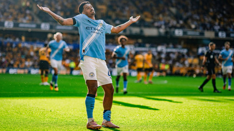 TERRIFIC TIJJANI: Wheels away to celebrate.