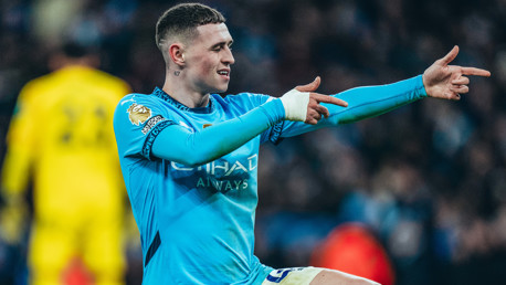 MARKSMAN: Foden celebrates in trademark fashion.