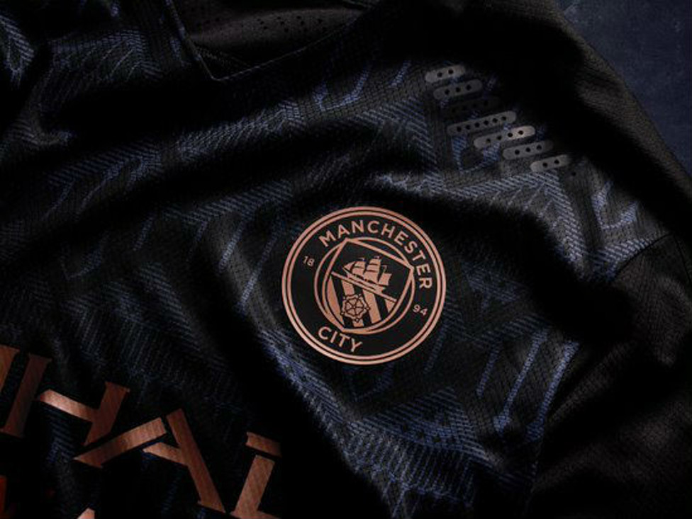 Notre badge, en couleur cuivre...