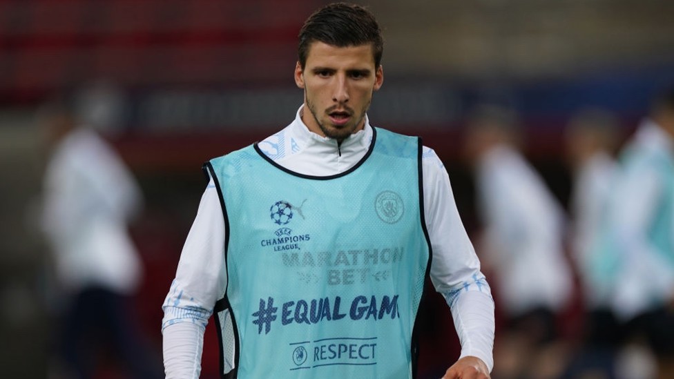 GAME FACE : Dias is fully focused as the pre-match warm up intensifies.