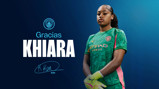 A female football player in a green goalkeeper jersey with the Manchester City logo. The text reads 'Gracias KHIARA' with a handwritten signature and number '35'.