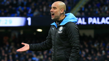 PEP TALK: The boss shouts out his instructions from the technical area.