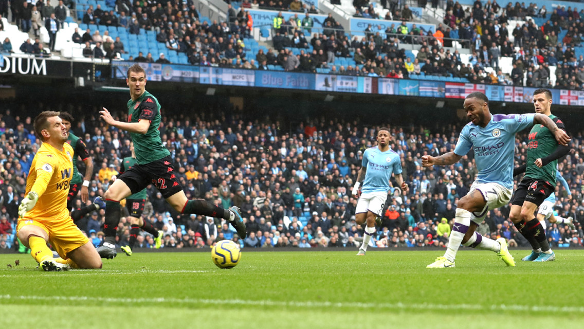 MAN ON FIRE: Raheem Sterling strikes a minute after the restart, firing into the near post