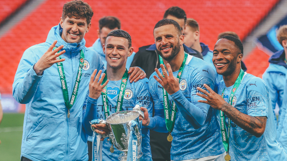 FAB FOUR : Celebrating a record fourth successive Carabao Cup with his England teammates