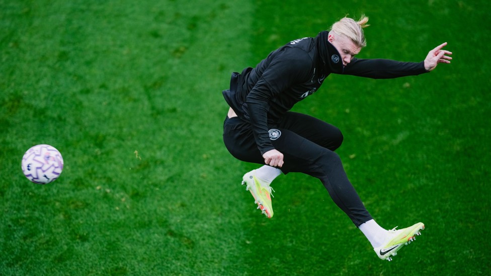 FLICK TOWARDS GOAL : Erling Haaland gets an acrobatic effort away