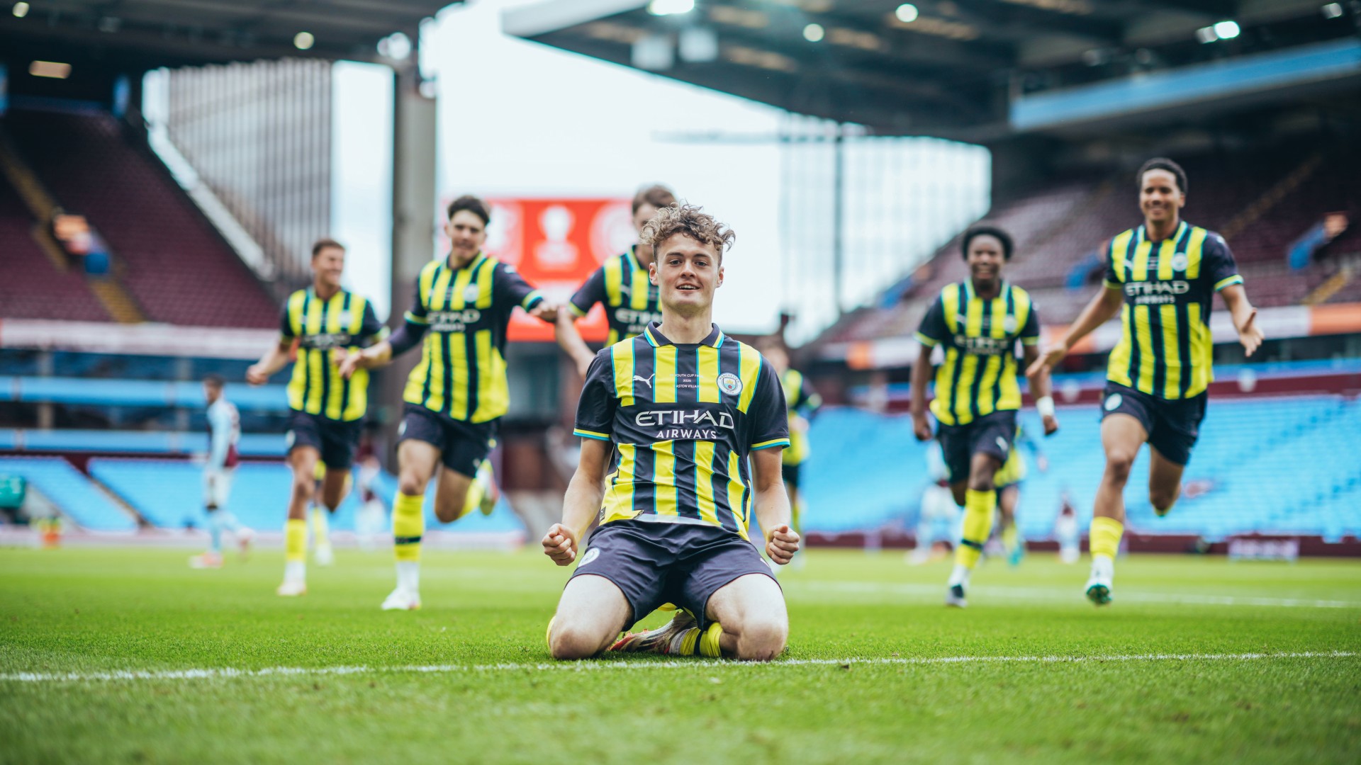 SLIDE RULE: Matty Warhurst celebrates after firing City ahead.