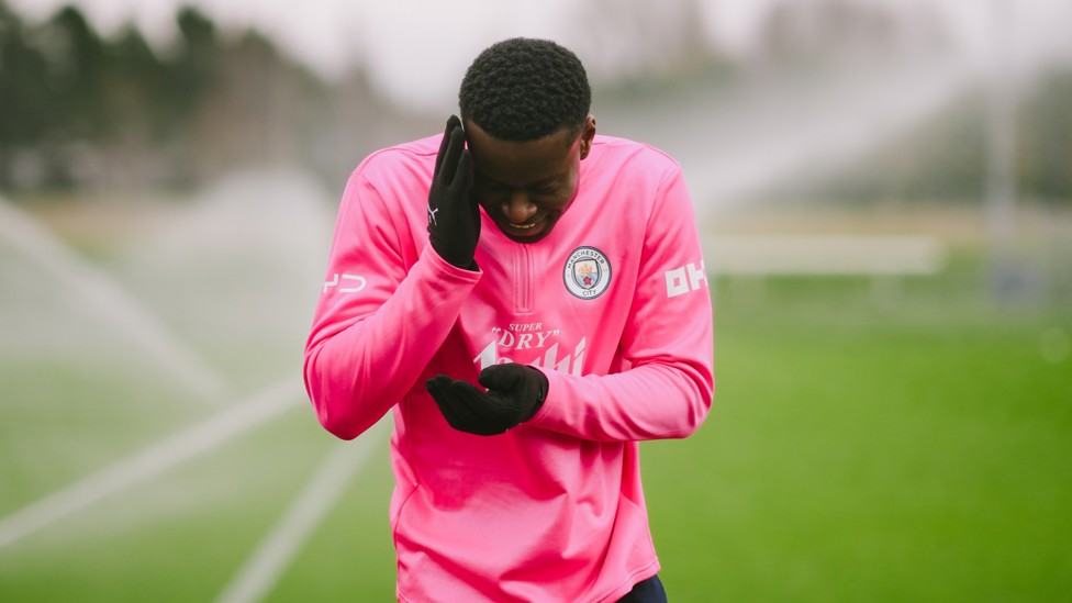 KEEPING DRY : Marc Guéhi dodges the sprinklers