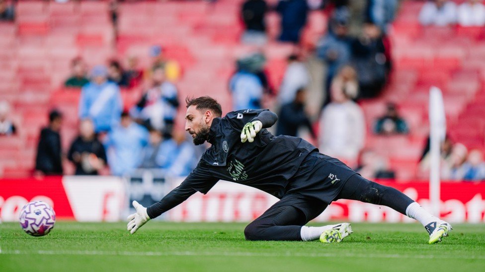 DIVING INTO IT:  Gianluigi Donnarumma warms up ahead of kick-off