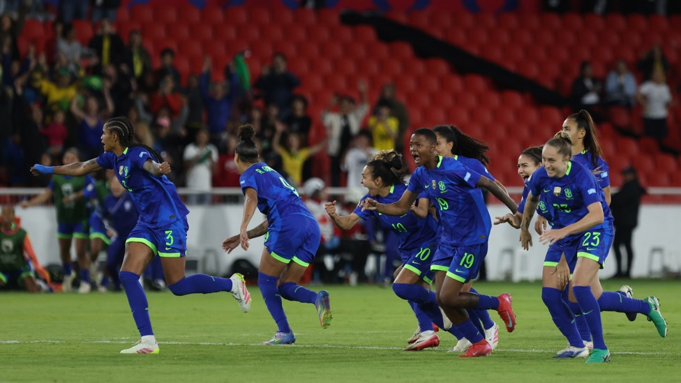 CHAMPIONS: Brazil players celebrate after the last penalty was taken and saved by Lorena Da Silva 