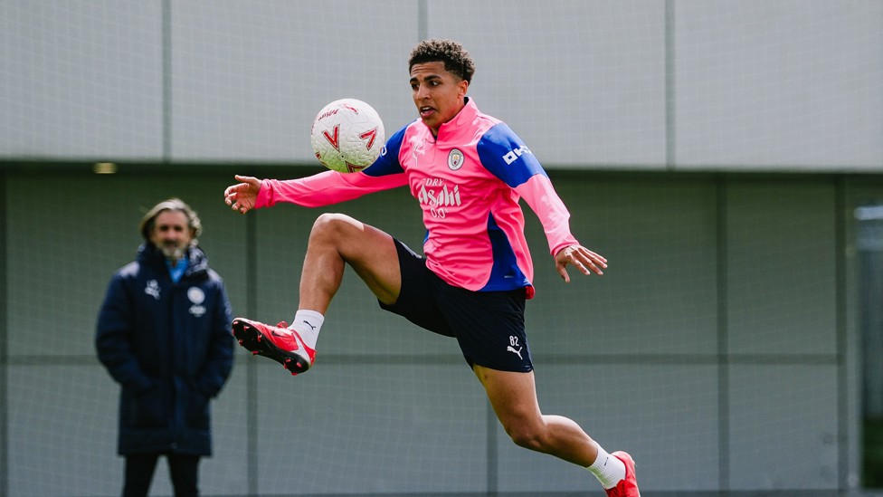 RICO LEWIS: More Rico - never letting his eyes off the ball