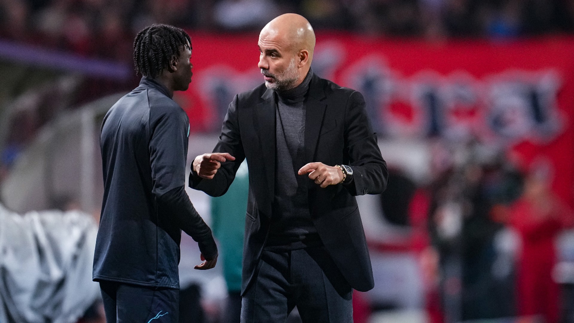 PRICELESS ADVICE: The boss passes on instructions to Susoho ahead of his City debut.