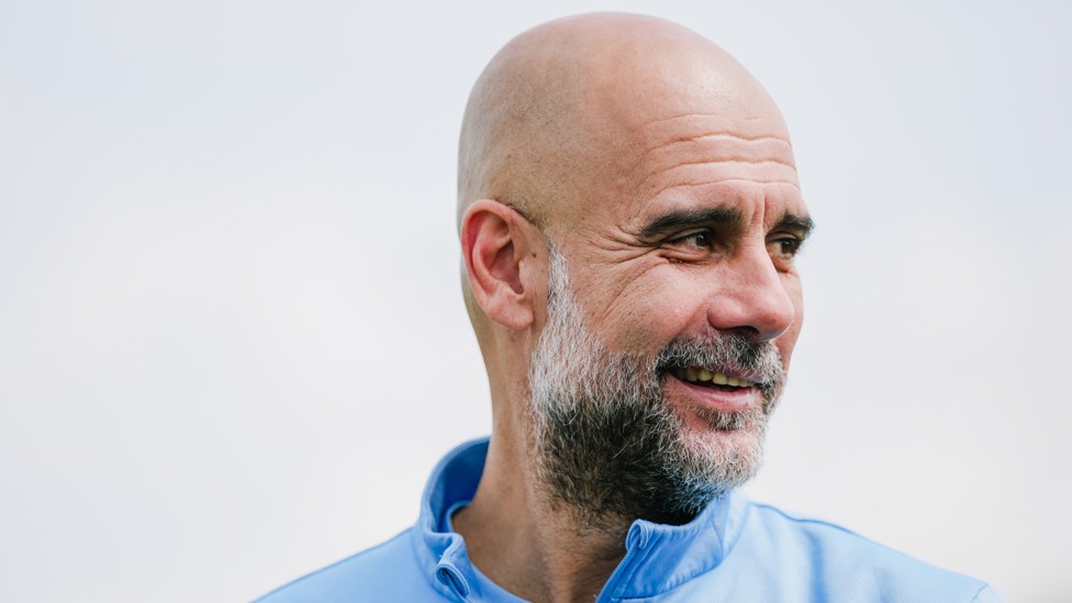 MAN OF THE MOMENT : Pep Guardiola enjoying the day
