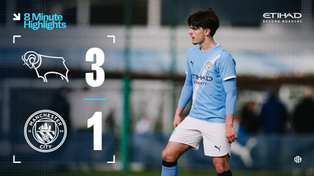 Scoreboard showing Derby County leading Manchester City 3-1. A Manchester City player is seen on the field wearing a blue kit with Etihad Airways sponsorship.