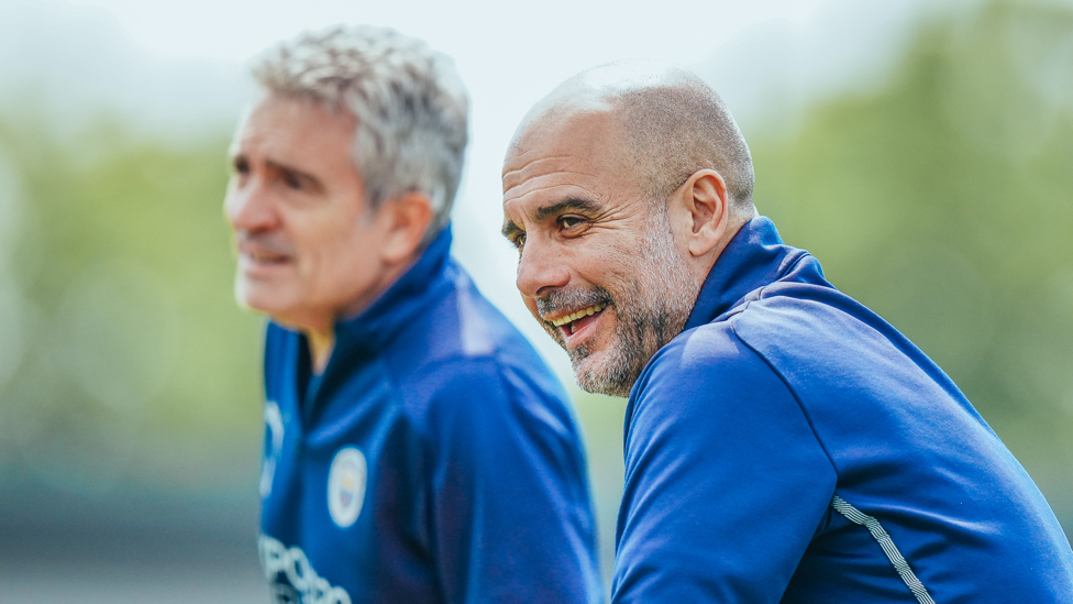 BRAINS TRUST : Juanma Lillo and Pep Guardiola watch over the session
