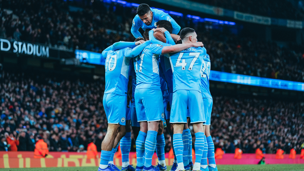 SQUAD GOALS : The team mob De Bruyne in celebration of our second strike of the evening 