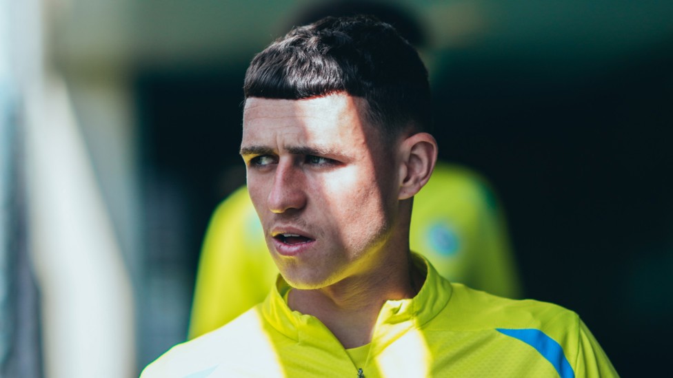 SHADOW PLAY: Phil Foden eyes up the next task in hand. 