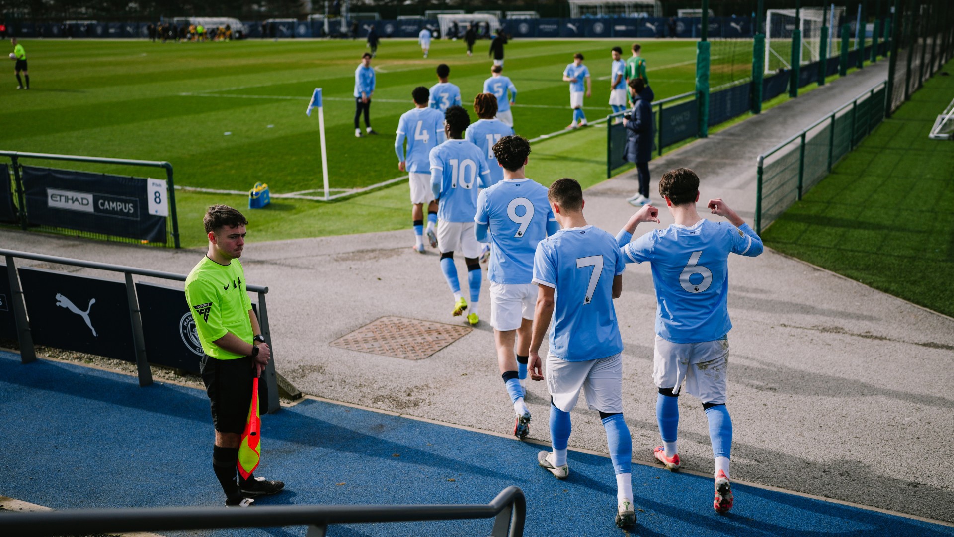 WALK OUT : City head out onto the pitch ahead of kick-off.