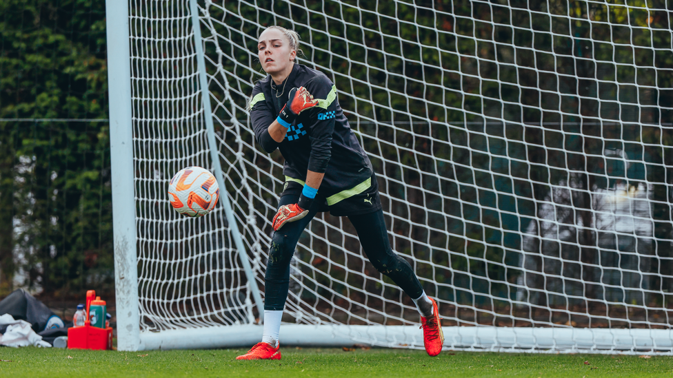 SAFE HANDS : Ellie Roebuck gets warm.