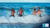 City take part in beach yoga recovery session