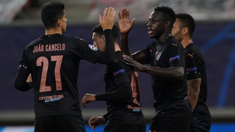 CELEBRATE: Mendy and Cancelo congratulate Foden.