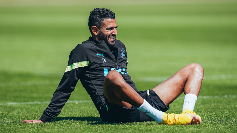 TAKE A SEAT : Riyad Mahrez finds a moment to relax during the session