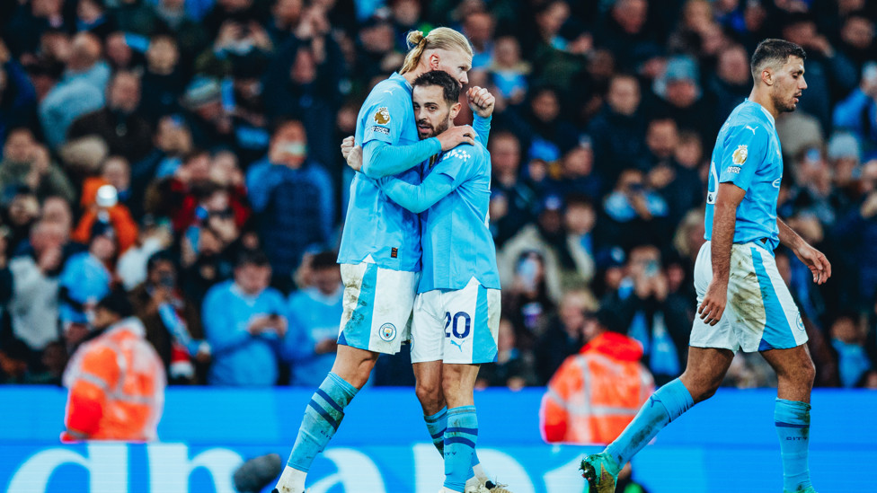 MY TURN : Bernardo next up for the Haaland hug.