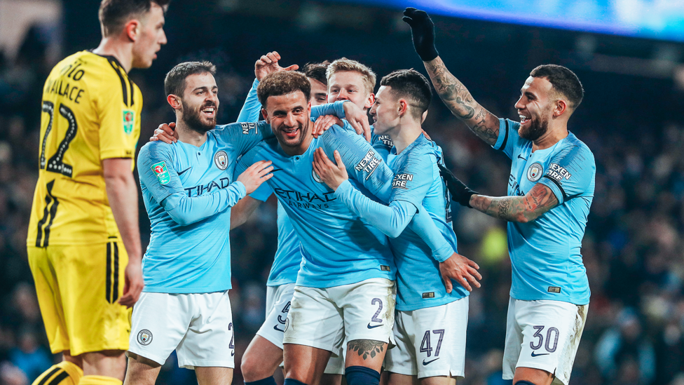 LOVED BY ALL : Kyle receiving a lot of affection from his teammates after he scored in our 9-0 win over Burton Albion in the 2018/19 League Cup campaign.