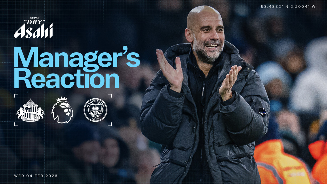 A manager clapping at a football match between Sunderland AFC and Manchester City, featuring the Premier League logo, sponsored by Asahi Super Dry.