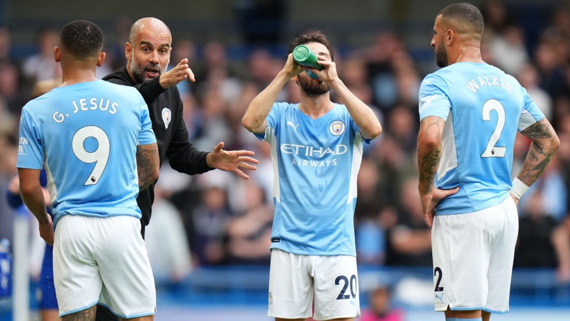 PEP TALK: The boss provides some instructions midway through the first-half.