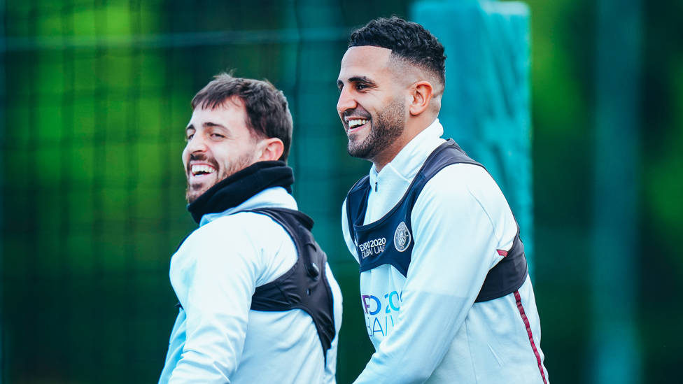 HIGH SPIRITS : Bernardo Silva and Riyad Mahrez crack a smile