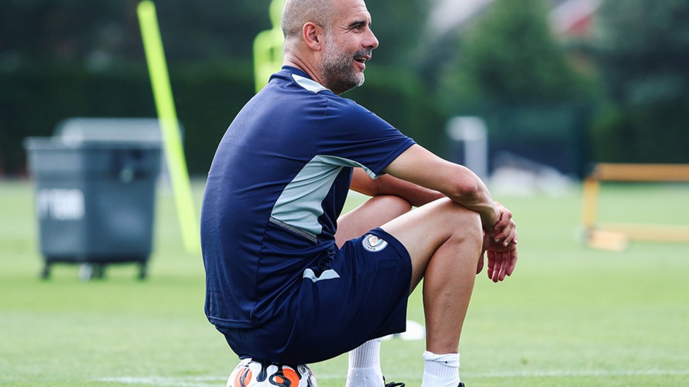 SITTING MIDFIELDER: Our manager watches on