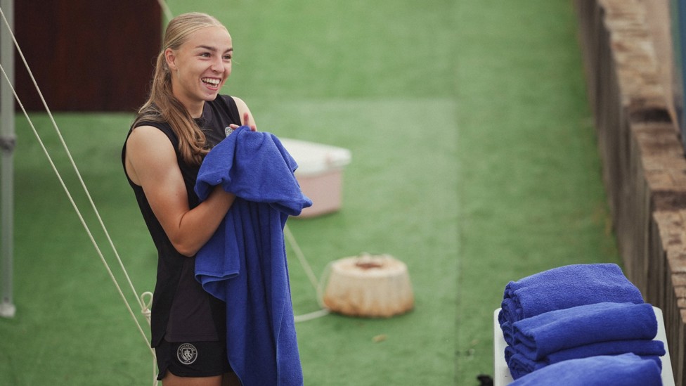 QUICK BREAK : Codie Thomas takes a quick pause to dry off. 