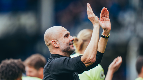 THE BOSS: Applauds the travelling fans.