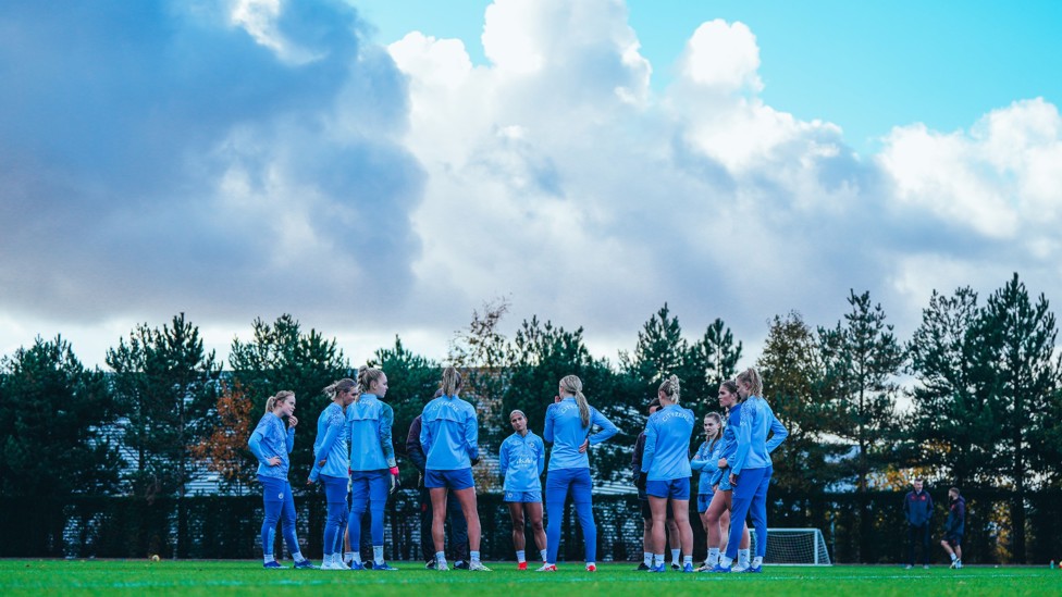 TEAM TALK : The squad discussing tactics.