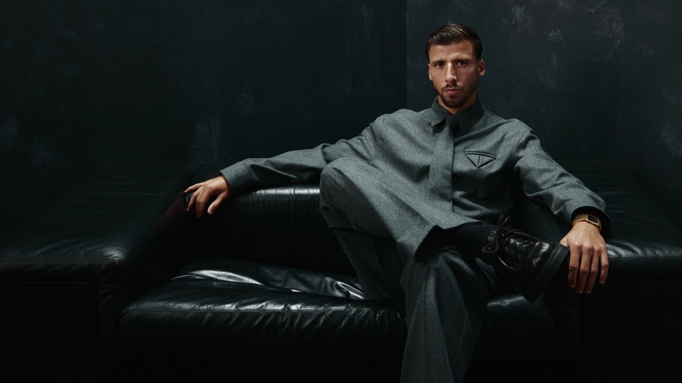 TAKE A SEAT : Our defender relaxes into the photoshoot