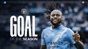 Blurry image of a Manchester City player celebrating a goal with 'Goal of the Season' text and club logo.