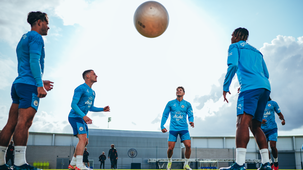 HONEY, I SHRUNK THE PLAYERS : A City quintet get familiar with an exercise ball.