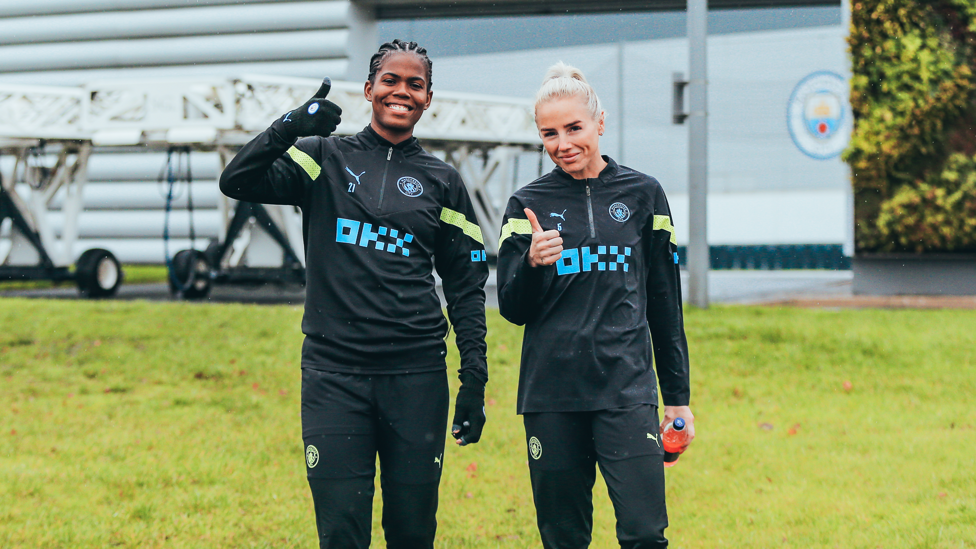 FOOTBALL FRIENDS : Khadija 'Bunny' Shaw and Alex Greenwood step onto the grass