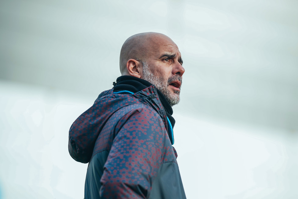 And more Pep, watching his troops...