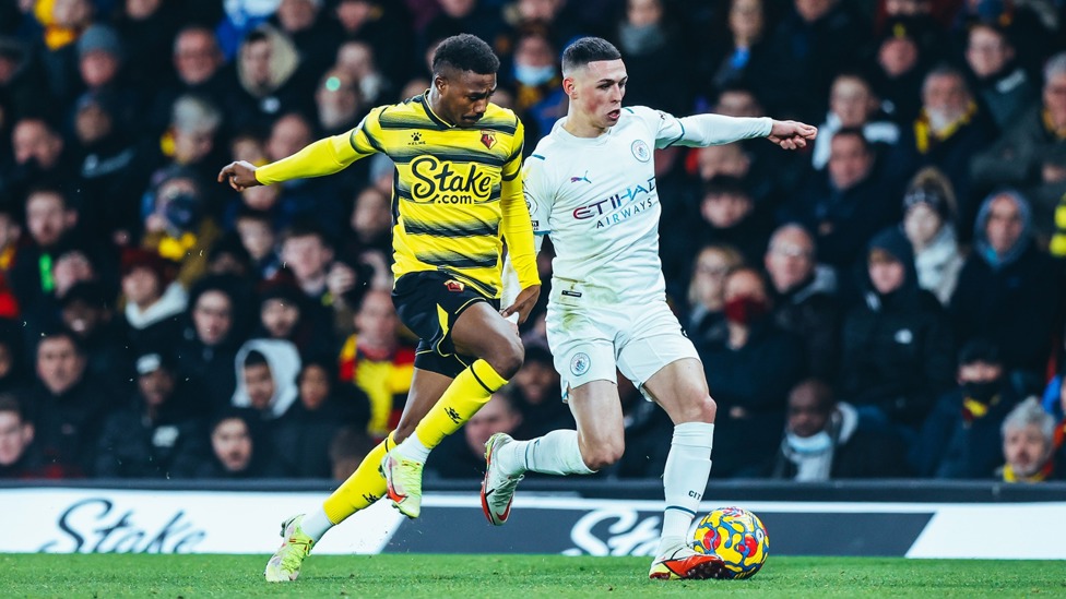 FLYING PHIL : Phil Foden races away from Emmanuel Dennis