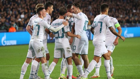 GROUP HUG: The team celebrate together again.