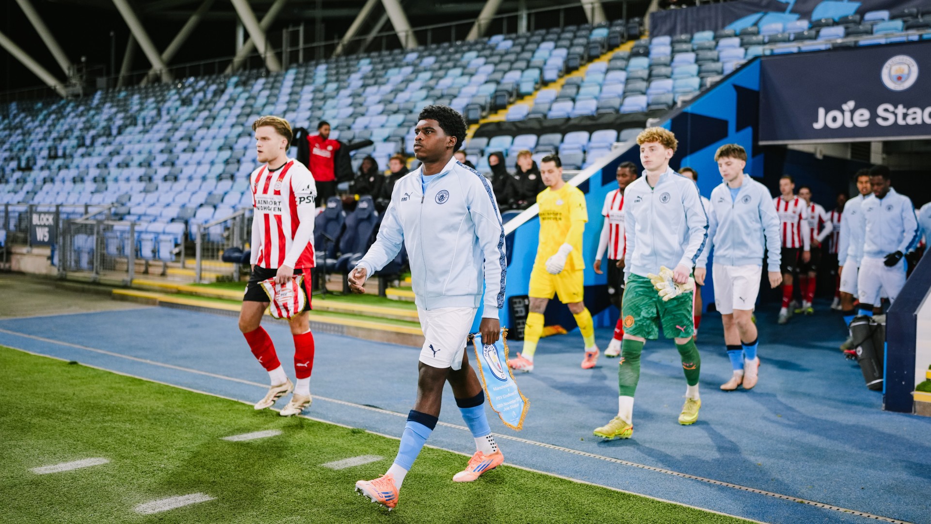 READY TO GO  : Jaden Heskey leads the team out. 