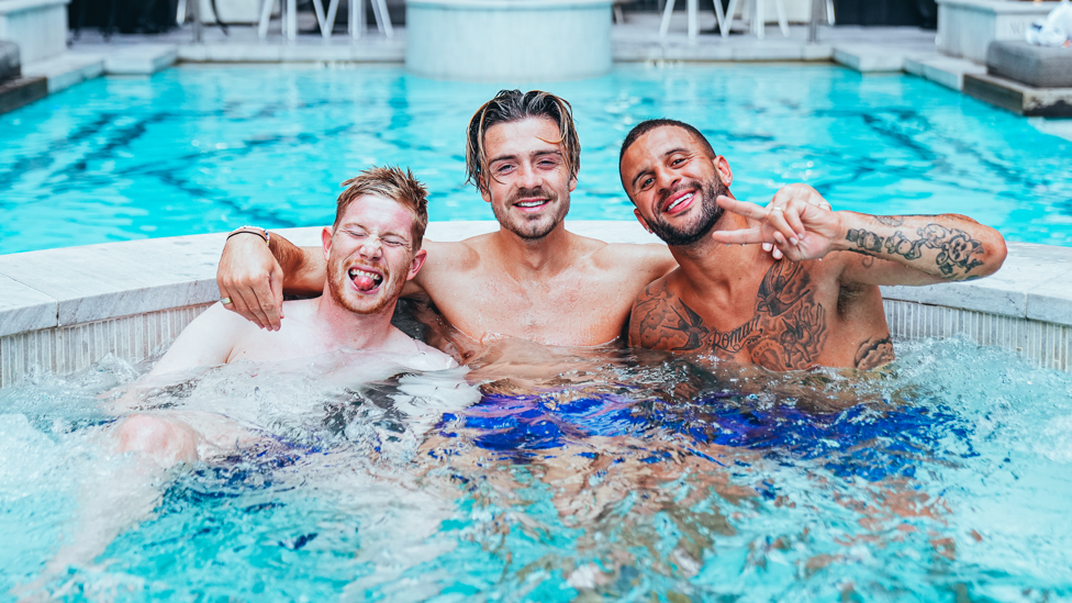 MAKING A SPLASH : Kevin De Bruyne, Jack Grealish and Kyle Walker take to the pool for some recovery. 