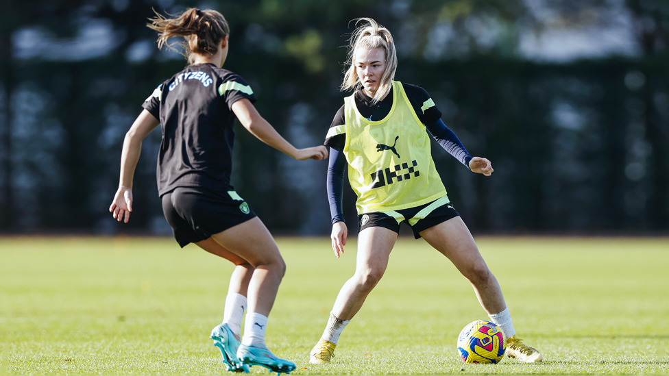 LOOKING FOR OPTIONS : Lauren Hemp works out the best way towards goal